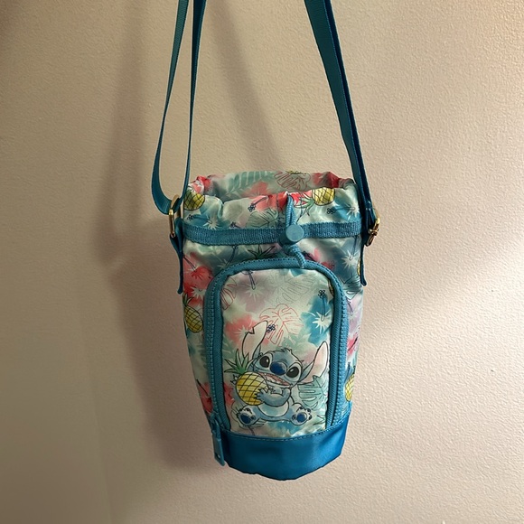 Crossbody water bottle bag. Has a pocket for card, money and many more. NWT - Picture 5 of 5